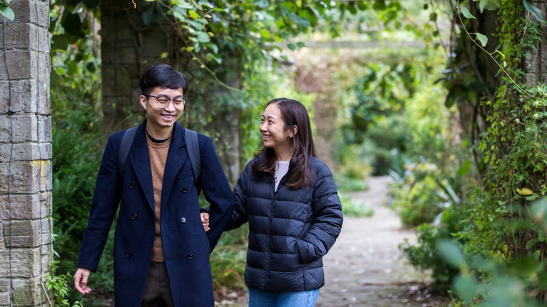 A couple walking in the formal gardens at Mount Stewart, County Down
